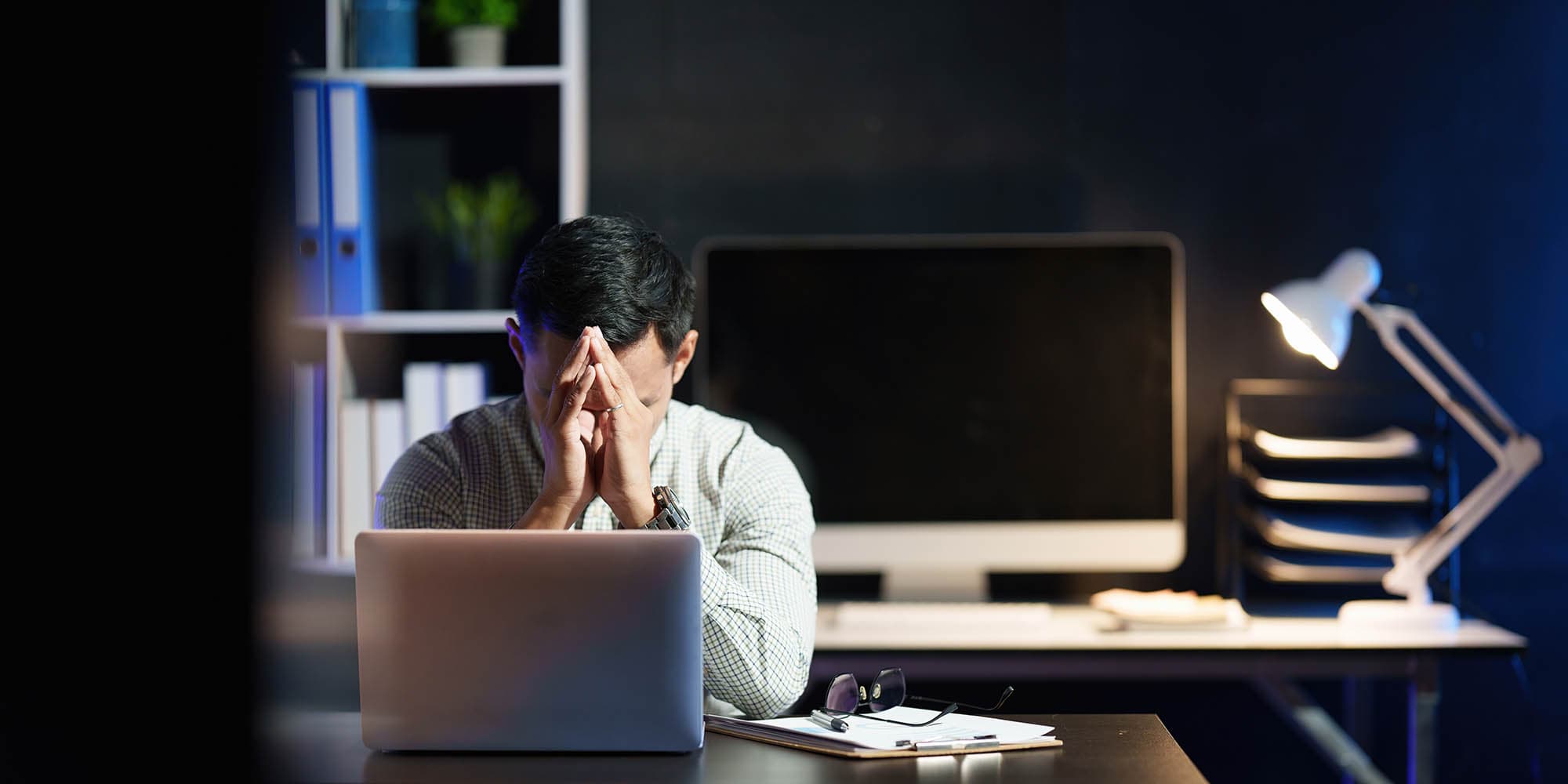 A young professional depressed and deep in stress